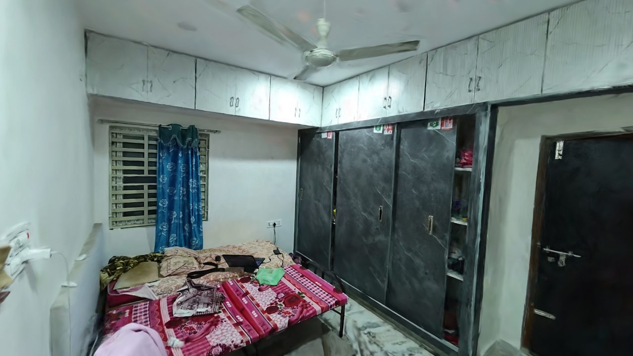 A bedroom rendered from the 3D Gaussian splat in the browser viewer